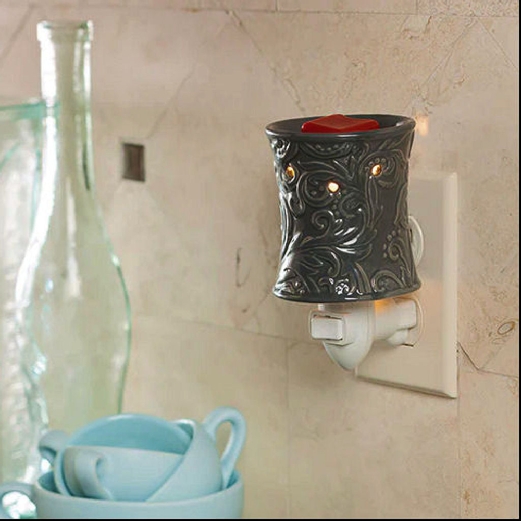Rainstorm pluggable candle warmer
